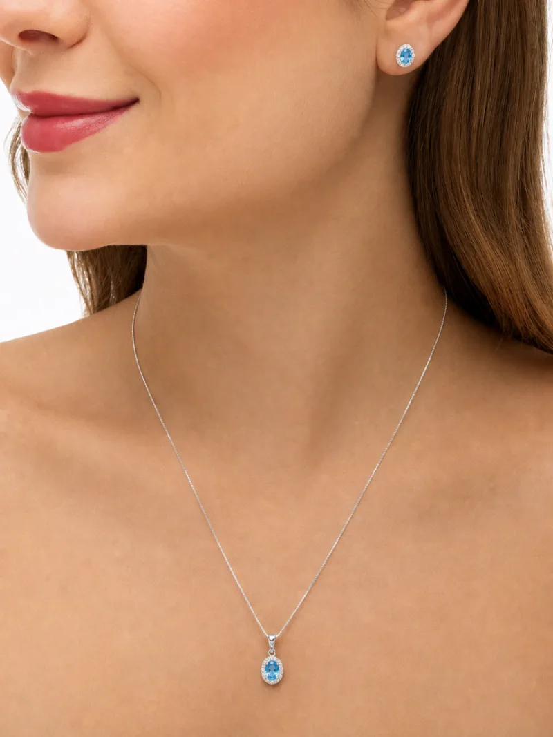 Conjunto de Prata 925 Zircônia Oval Azul Cravejada em Volta